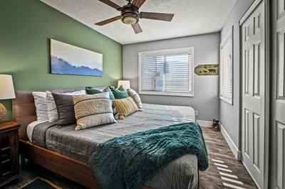 Bedroom w/ King-Size Bed & Earthy Mountain Color Palette