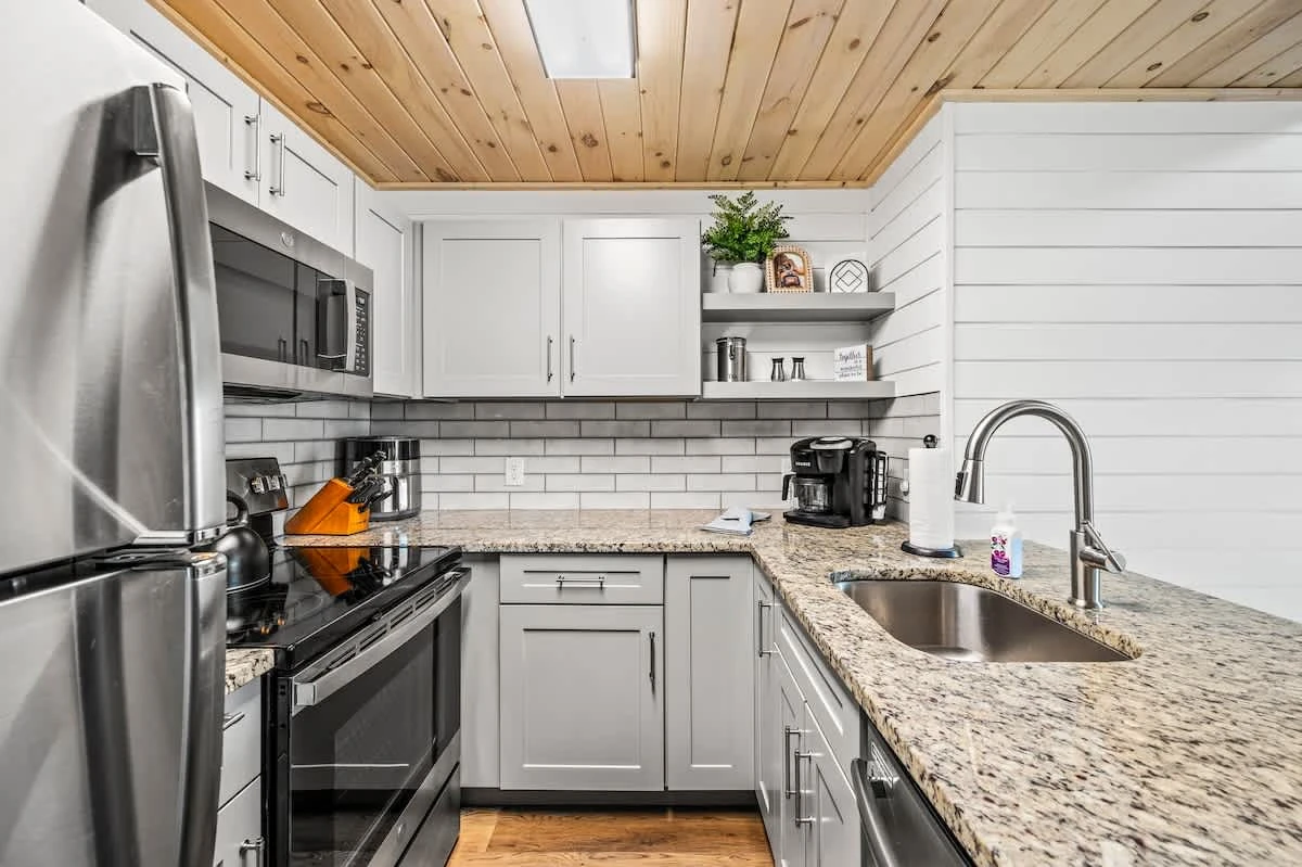 Features all stainless steel appliances and is fully stocked with all kitchen essentials