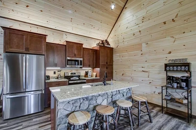 kitchen of honey bear hill, one of our affordable Pigeon Forge cabins