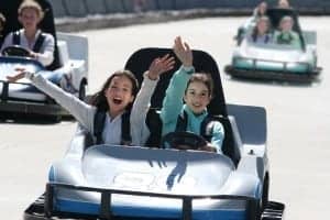 Two girls in a go kart