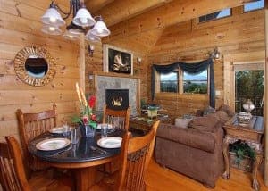 The living room and dining area in a Slice of Paradise cabin in Gatlinburg.
