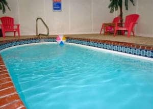 Indoor private swimming pool at a rental cabin in Pigeon Forge, Tn