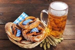 Beer and pretzels at an Oktoberfest celebration.