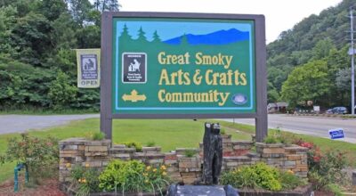 A sign at the entrance of the Great Smoky Arts & Crafts Community in Gatlinburg.