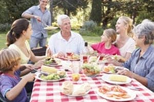 A multigenerational family having a picnic.