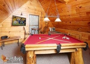 Pool table at a cabin rental.