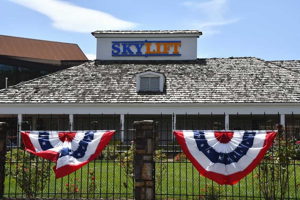 Red white and blue flags decorate Gatlinburg Sky Lift